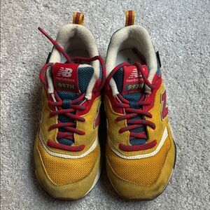 New Balance Yellow and Red Sneakers with Retro Style